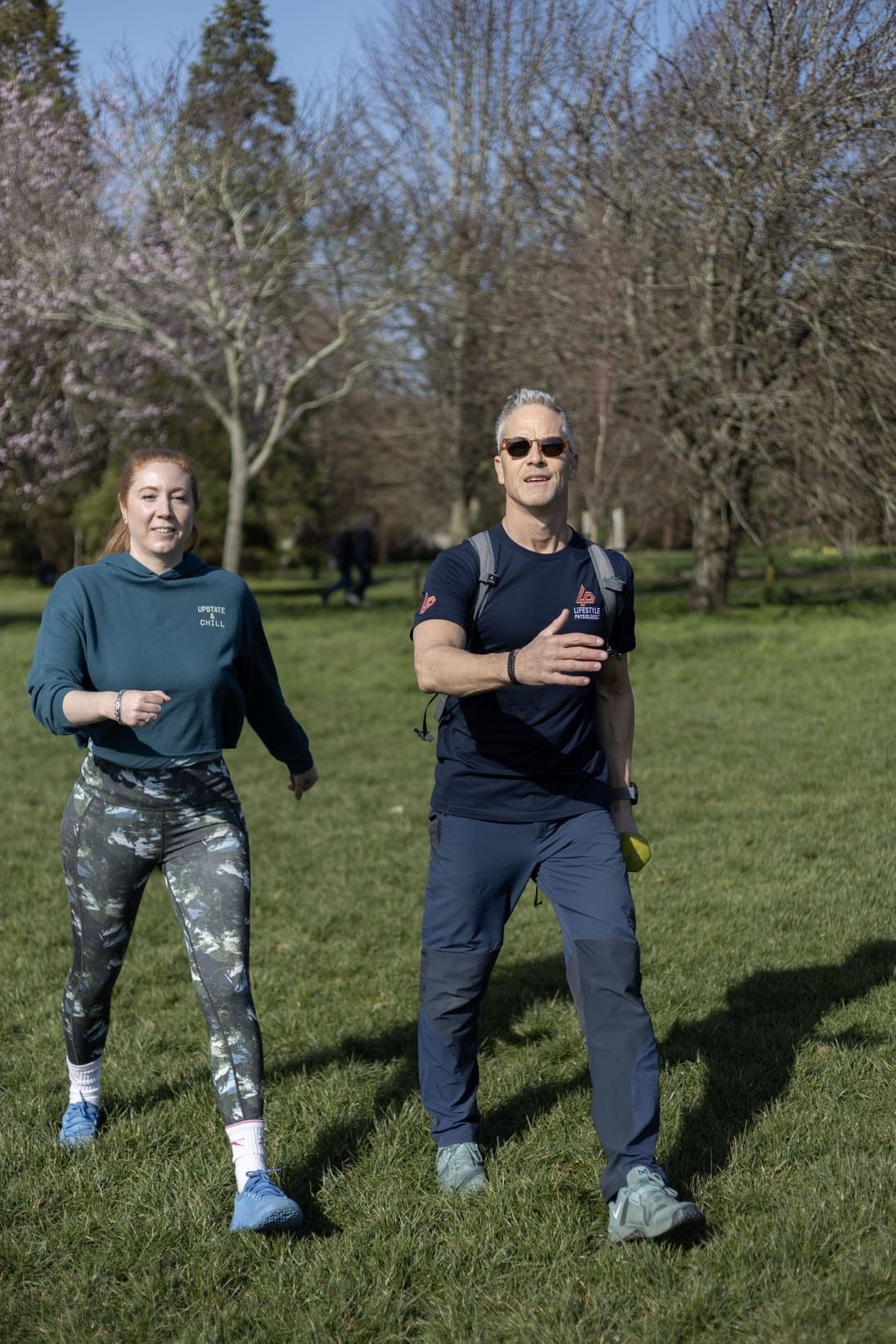 Richard and client walking outdoors during a Walk & Talk coaching session